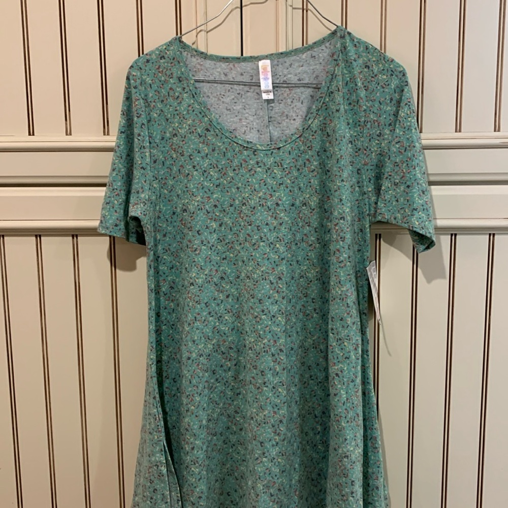 LuLaRoe size small perfect tea. These can be sized up like two sizes. Very soft.